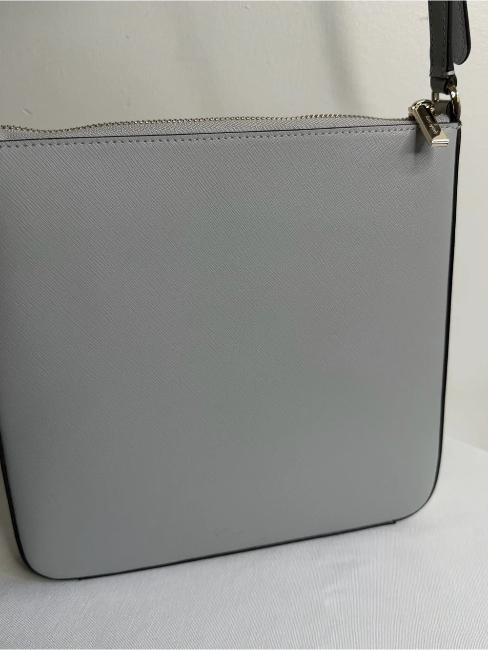 kate spade light gray saffiano leather messenger bag with gold hardware
